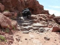 Alvins Dad Going Down the Hanging Cliff Moab - 05182013.jpg